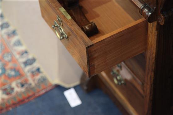 Attributed to Gillows. A Victorian gothic revival rosewood pedestal desk, W.4ft 8in. D.2ft 2in. H.2ft 5.5in.